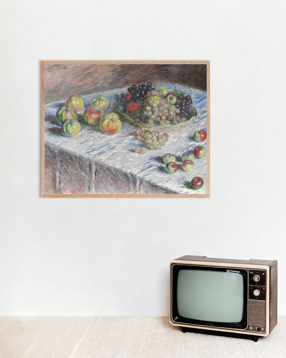 Poster Maçãs e Uvas (1880), de Claude Monet, com moldura de madeira natural